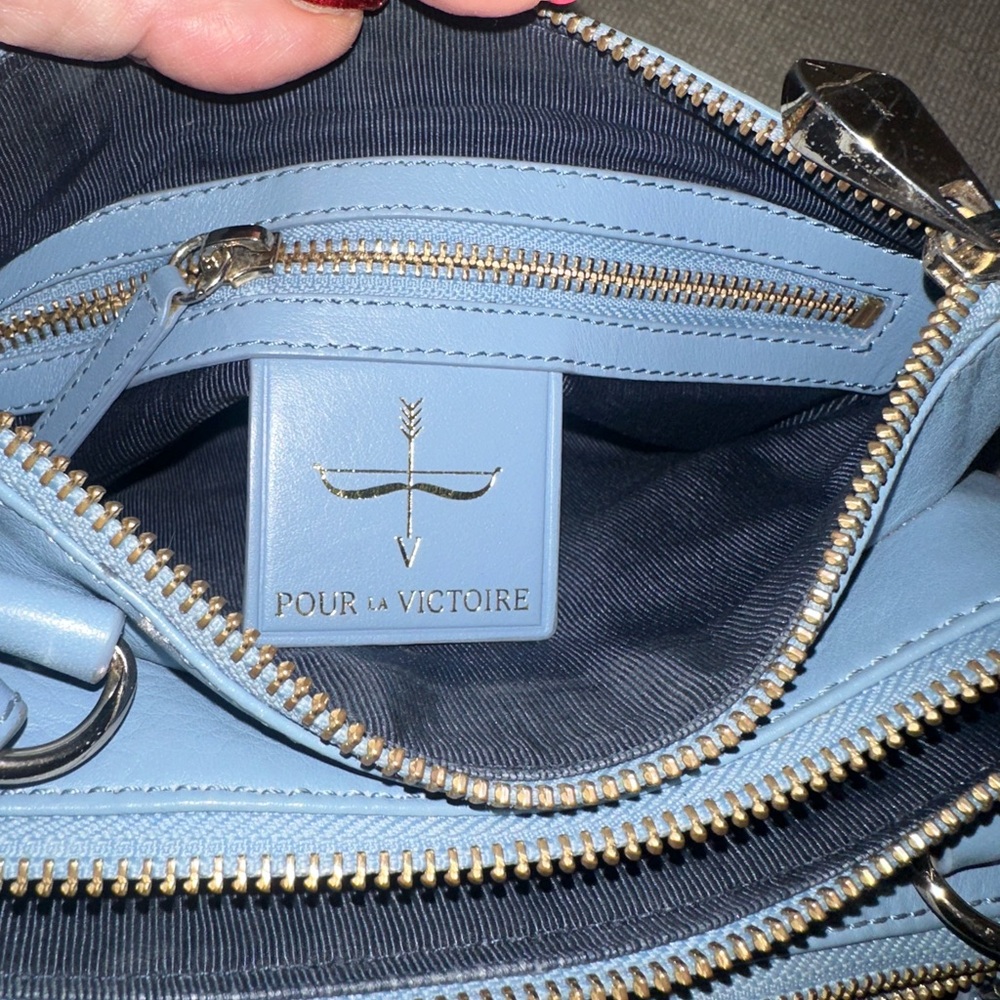 Pour Victore slate blue leather handbag